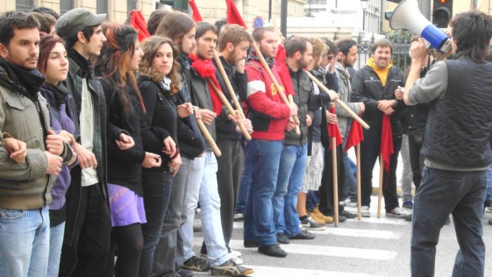 On the front line – courageous youth march to remember the murder of 15-year-old Alexis Grigoropoulos who was killed by police a year ago