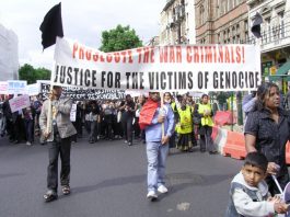Tamils marching in London on June 20 demanding Sri Lankans responsible for genocide be prosecuted for war crimes