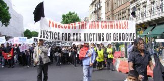 Tamils marching in London on June 20 demanding Sri Lankans responsible for genocide be prosecuted for war crimes
