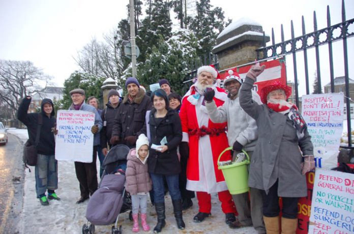 Father Christmas visits yesterday morning’s ‘Keep Chase Farm Hospital Open’ picket called by the North East London Council of Action