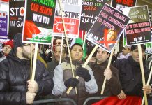 A section of the over 2,000-strong picket of the Israeli embassy in London last night to mark the first anniversary of the Israeli bombardment of Gaza