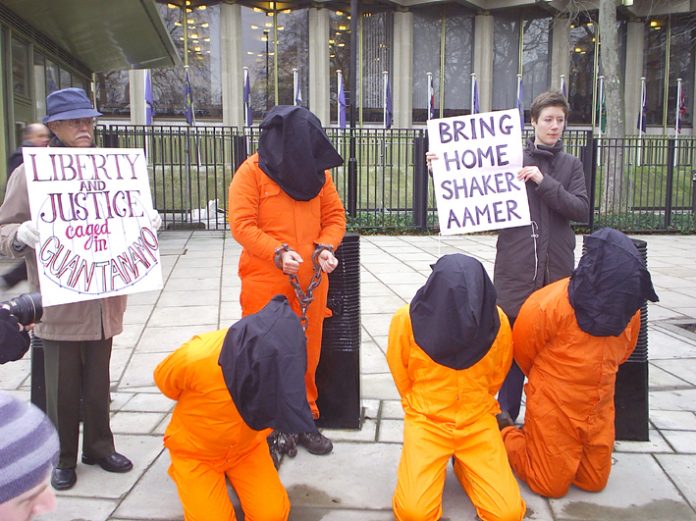 Protesters outside the US embassy in London yesterday calling for Guantanamo Bay prison to be closed down