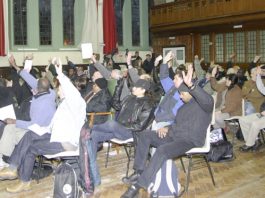 A section of the Council of Action Conference voting on the resolution
