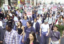 Marchers in London in September 2005 against the war on Iraq condemn Bush and Blair as war criminals