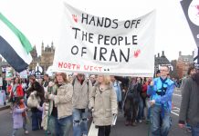 Demonstrators in London defending the Iranian people against attempts by the US and UK to attack them