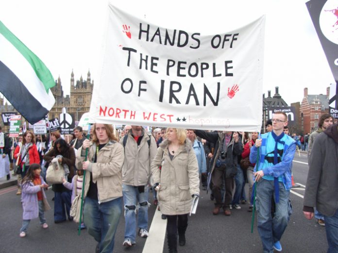 Demonstrators in London defending the Iranian people against attempts by the US and UK to attack them
