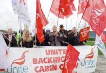 Striking BA cabin crew on the picket line at Heathrow yesterday