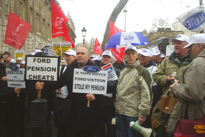 Angry Visteon workers demanding their pensions outside Downing Street yesterday afternoon