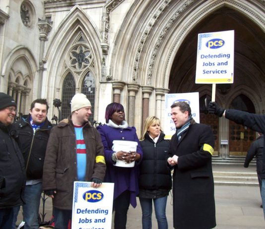 PCS general secretary MARK SERWOTKA (second from right) with PCS pickets at the law courts during their strike on March 9th