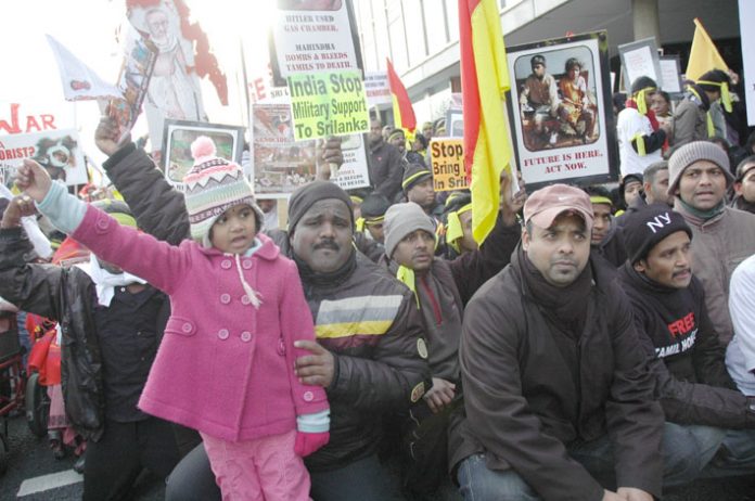 Marchers in London demanding the Indian government stop military support to the Sri Lankan regime