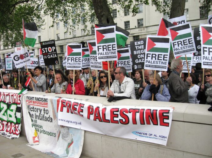 Demonstrators outside parliament commemorate the 60th anniversary of the ‘Nakba’ (catastrophe) and demand freedom for Palestine and the lifting of the siege of Gaza