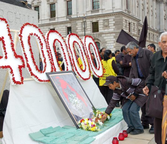 Generations of Tamils lay flowers in Parliament Square to commemorate the 40,000 civilians killed during the final stages of the Sri Lankan army war against the Tamil Tigers