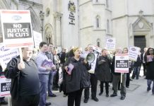 PCS members demonstrate outside the High Court during their appeal to defend their conditions