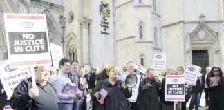 PCS members demonstrate outside the High Court during their appeal to defend their conditions