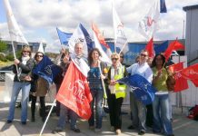 Determined BA cabin crew on the picket line at Heathrow yesterday