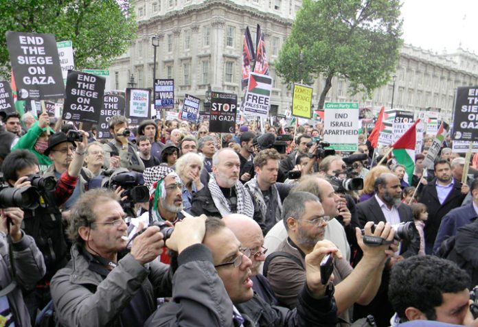 Angry crowds massing outside Downing Street yesterday afternoon