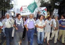 Freedom Flotilla volunteers back from a Zionist prison leading the Athens march