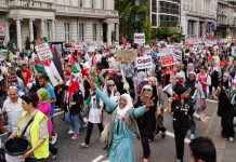 A section of Saturday’s 25,000-strong ‘Gaza Flotilla March’ makes its way towards the Israeli Embassy in Kensington