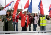 Striking BA cabin crew at Heathrow yesterday determined to win their struggle