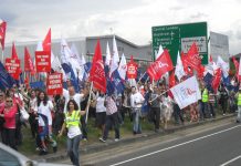 Defiant cabin crew marching around Heathrow to show that they are looking forward to the next round of the struggle with BA union-buster Walsh