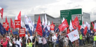 Defiant cabin crew marching around Heathrow to show that they are looking forward to the next round of the struggle with BA union-buster Walsh