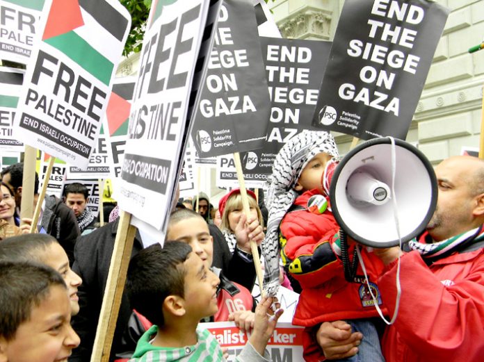 Demonstrators outside Downing Street on May 31 demand an end to the siege of Gaza