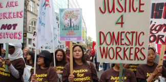 Domestic workers marching against low pay on the May Day march in London