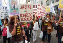 Migrant workers in the front of the May Day march in London – defending their jobs and wages