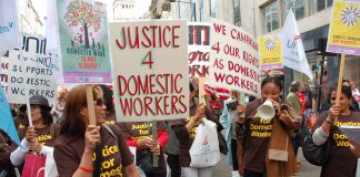 Migrant workers in the front of the May Day march in London – defending their jobs and wages