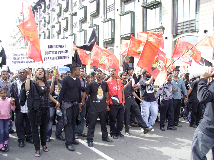 Demonstrators in London in June last year demand that those responsible for the massacres of Tamil civilians be punished