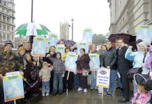 Civil servants and their children defending jobs and benefits in central London pointed out that there could be as much as £100 billion outstanding in tax fraud