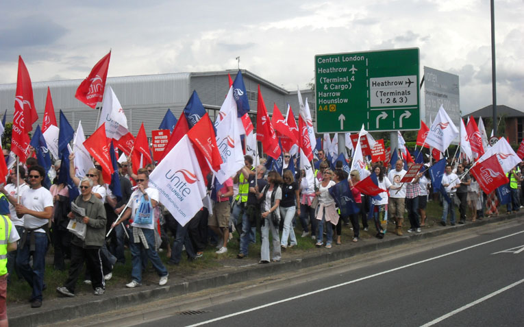 Striking BA cabin crew marching defiantly through Heathrow – are demanding that Unite names the dates for more strike actions to win their dispute