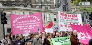 Students and striking lecturers marching from King’s College in May against education cuts