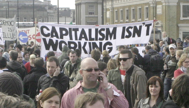Anti-capitalist demonstrators taking to the streets of London following the crash of the banks in 2008. The crisis of mass unemployment and inflation is intensifying