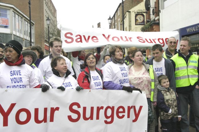 GPs demonstrating in Rugby against the privatisation of surgeries