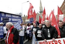 Waterford Crystal workers marching in Dublin in February last year demanding that the government act to defend jobs