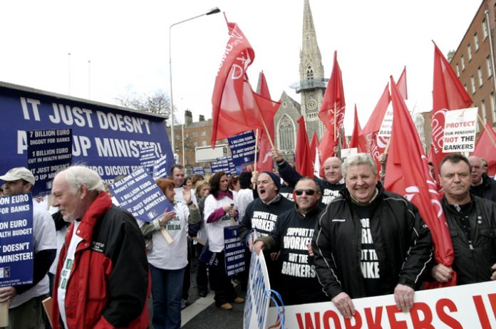 Waterford Crystal workers marching in Dublin in February last year demanding that the government act to defend jobs