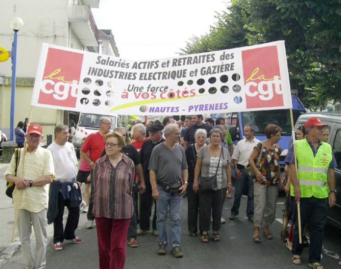 CGT members marching in defence of jobs. French unions have called for a massive turnout next Tuesday in defence of pensions