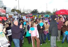 Section of a mass rally in front of St Helier Hospital determined to fight any NHS cuts