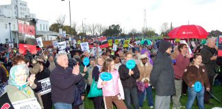 Section of a mass rally in front of St Helier Hospital determined to fight any NHS cuts