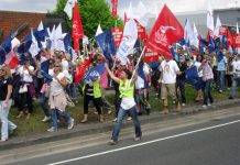 Striking BA cabin crew marching at Heathrow on June 9. They are demanding indefinite strike action to win their dispute