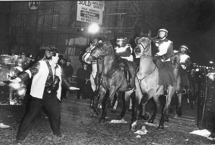 Murdoch has had a long association with Tory governments and the state. Picture shows mounted police charging pickets at the News International plant at Wapping, established after Murdoch sacked 6,000 Fleet Street printers in 1986
