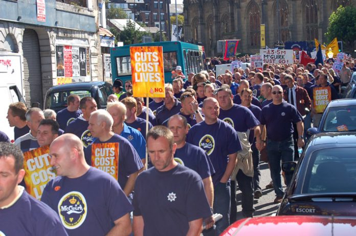 Firefighters marching in Liverpool in September 2006 against cuts imposed by chief fire officer McGuirk