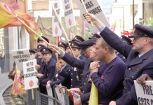 London firefighters rallying yesterday outside the London Fire Brigade Headquarters – they are absolutely determined to defend their hard won conditions