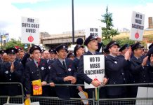 London firefighters on Thursday marched to the Fire Brigade headquarters where they decided to have a strike ballot to defend their jobs