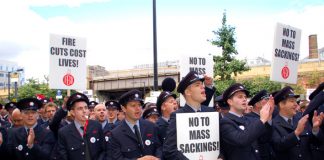 London firefighters on Thursday marched to the Fire Brigade headquarters where they decided to have a strike ballot to defend their jobs
