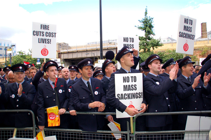 London firefighters on Thursday marched to the Fire Brigade headquarters where they decided to have a strike ballot to defend their jobs