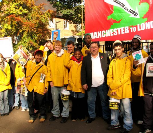 YS marchers assemble with local busworkers union official John Hughes before their march on Saturday