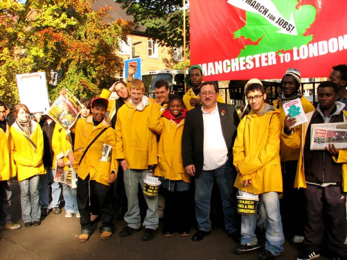 YS marchers assemble with local busworkers union official John Hughes before their march on Saturday