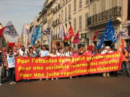 French workers marching in Marseilles demand the government abandon their policiy to increase the pensionable age